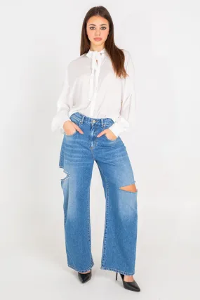 Jeans oversize con tagli